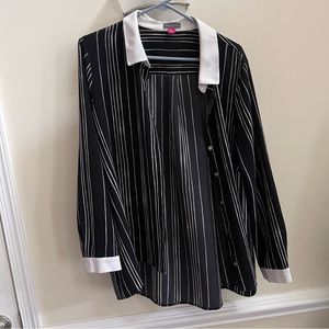 Black and white striped oversized button down with contrast cuffs and collars.